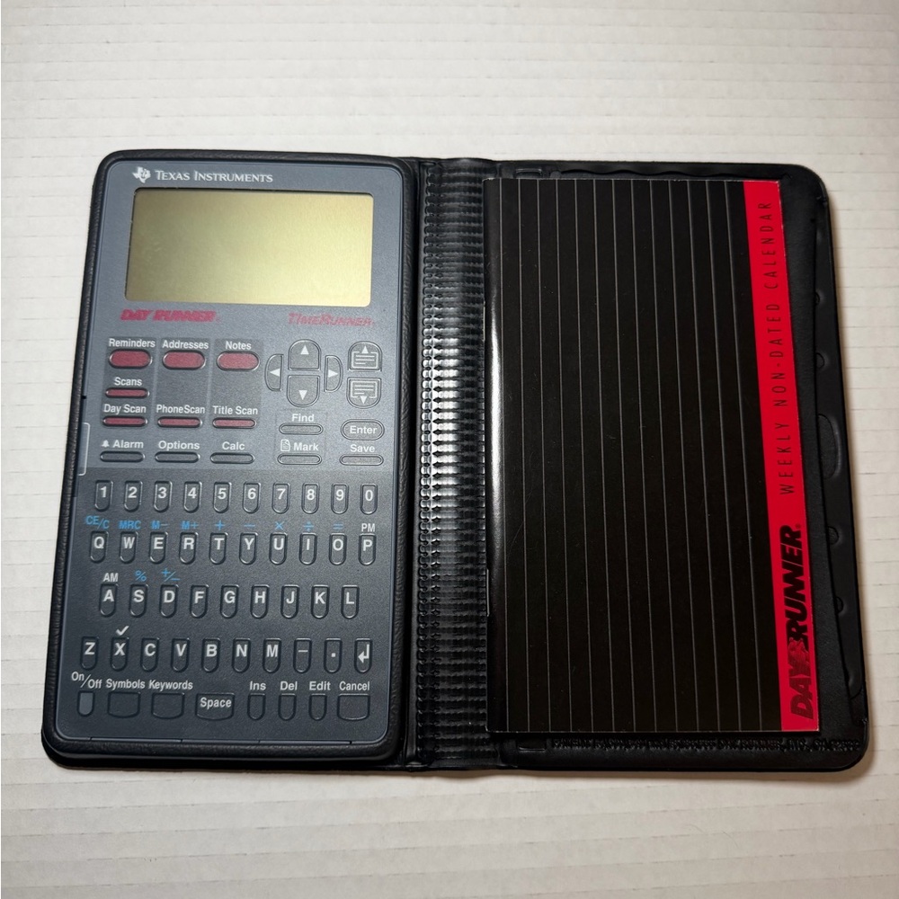 Texas Instruments TImeRunner PS-9500 64K RAM Black Handheld Electronic Organizer